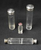 A George V silver topped cut glass scent bottle, having pink guilloche enamel to the silver top,