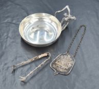 An Elizabeth II silver taste de vin, of circular form with domed centre, having engraved 'K.E'