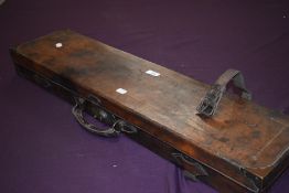 A Leather fitted gun case by Morrow and co Halifax measuring 82cm x 21cm x 10cm the catch works