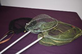 Three landing nets of various sizes