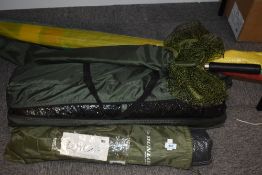 Two small bank side fishing tents a landing net and windbreak