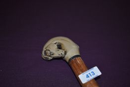 A walking stick with a cast resin head of a horse 144cm long