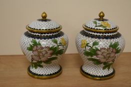 A beautiful pair of Chinese Cloisonne enamel baluster form lidded jars, skillfully crafted with