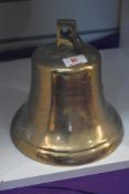 A small cast brass ship's bell, lacking clanger, h17cm