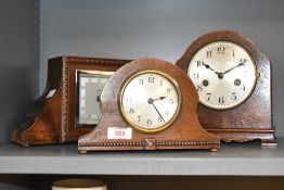 An early 20th century 8 day German oak mantel clock in the Art Deco style, stamped inside Hamburg,