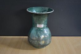 An early 20th century Ruskin pottery art vase, having flared rim over alabuster body, decorated in