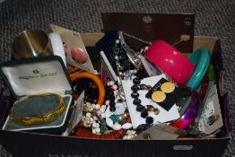 A large assortment of costume jewellery, including clip on earrings, beaded necklaces, bangles, drop