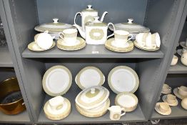 A Royal Doulton Fine Bone China dinner service, decorated in the Sonnet pattern No.H5012, having a