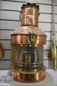 A large early 20th century copper and brass Masthead navigation ship lantern, having a bow-fronted