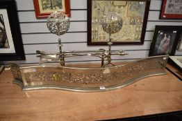 A 19th century steel serpentine fireplace fender raised over a pierced front, beautifully