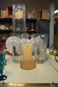 A group of glass vases, to include a large cylindrical clear glass vase, h60, a Stuarts glass