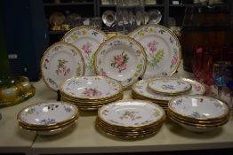 A Royal Worcester Fine Bone China part dinner service, having gilt edging and hand coloured