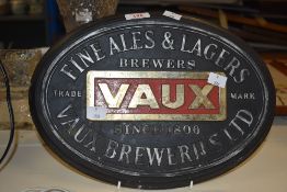 A heavy vintage Vaux Breweries Fine Ales & Lagers pub sign, w36cm.