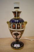 A Royal Crown Derby table lamp base, of urn form and decorated in the Old Imari pattern, marked to