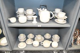 A Hornsea Concept teas service, decorated in the Art Deco style, having geometric designs and swan