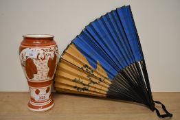 An early 20th century Japanese Kutani baluster vase, decorated having red and gold colour figures on