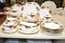 A 1960's Royal Albert Bone China part tea / dinner service, decorated in the Old Country Roses