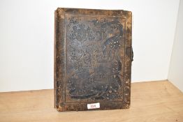 A 19th century embossed leather and gilt Carte de visite album, inside reading, 'The Victorian