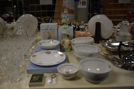 A group of Beatrix Potter Wedgwood Bone China plates and figures, to include Peter Rabbit,