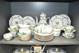 An early 20th century Herend porcelain tea set, hand painted in the Chinese bouquet pattern,