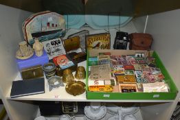 A collection of early 20th century advertising memorabilia, to include miniature matchboxes, biscuit