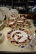 A part Royal Doulton bone China tea service, decorated in the Tuscan pattern, to include two large
