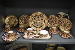 An early 20th century Royal Crown Derby bone china tea and expresso service, decorated in the