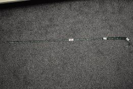 A late 19th / early 20th century barley twist green glass walking stick of nailsea type, 99cm.