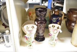 A vintage Bohemian cut to clear deep cranberry crystal glass vase, h31cm, sold together with a