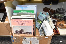 A box containing various history of art / beginners guide handbooks, to include pastel, sketching,