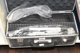 A modern table top Meade spotting scope with tripod and original box.