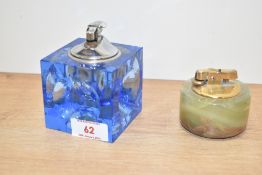 A vintage blue dimpled cut glass cube table lighter, h9cm, sold alongside a Ronson green and gold