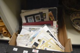 A selection of various first day covers and stamps, the majority being housed in folders/albums
