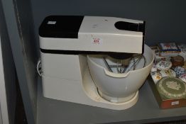 A vintage Kenwood chief electric mixer including wire whisk and Kenwood dough hook, mixer length