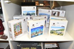 A group of Wentworth wooden jigsaw puzzles, to include The 17.30 to Swanage, Winter in the City ect,