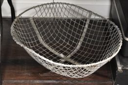 A large vintage French wire market produce basket, w63cm x h29cm.