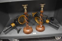 A lovely pair of late 19th / early 20th century oak barley twist candlesticks, h31cm, sold