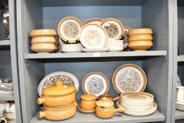 A Denby Langley Canterbury stoneware part dinner service, to include ashet, soup bowls, saucers ect,