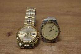 A Seiko Lassale wristwatch, the yellow dial having baton numerals and date aperture on a stainless