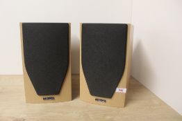 A pair of Mission M71 speakers.
