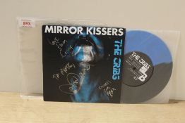 A fully signed Cribs - Mirror Kissers - 45 -rare and in ex condition