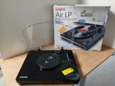 A boxed Ion Audio Max Wireless bluetooth streaming turntable