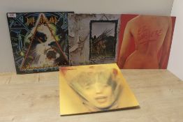 A seven album mixed lot - rock interest as in photos - been well cared for , some nice titles in