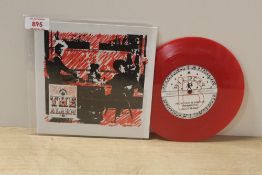 An Alarm red vinyl ' Unsafe Building / Up for Murder ' seven inch single - wildcat records promo