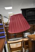 A reproduction brass reading light