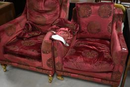 A pair (ladies and gents) easy chairs in the Oriental style, by Duresta