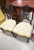 A pair of Victorian mahogany salon chairs