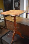 A 19th Century mahogany occasional table having shaped top with turned column and triple splay legs