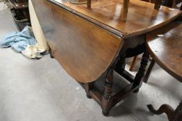 A period style oak gateleg dining table, width approx. 120cm