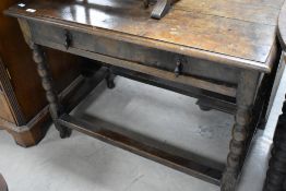 A 19th Century and later low side table having bobbin turned frame, width approx. 93cm